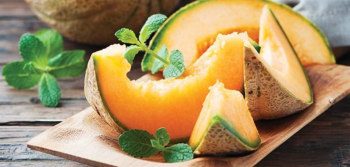 Hearts of Gold Melon growing on the vine