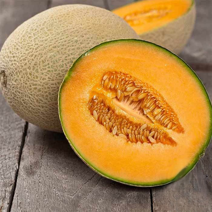 Hearts of Gold Melon growing on the vine
